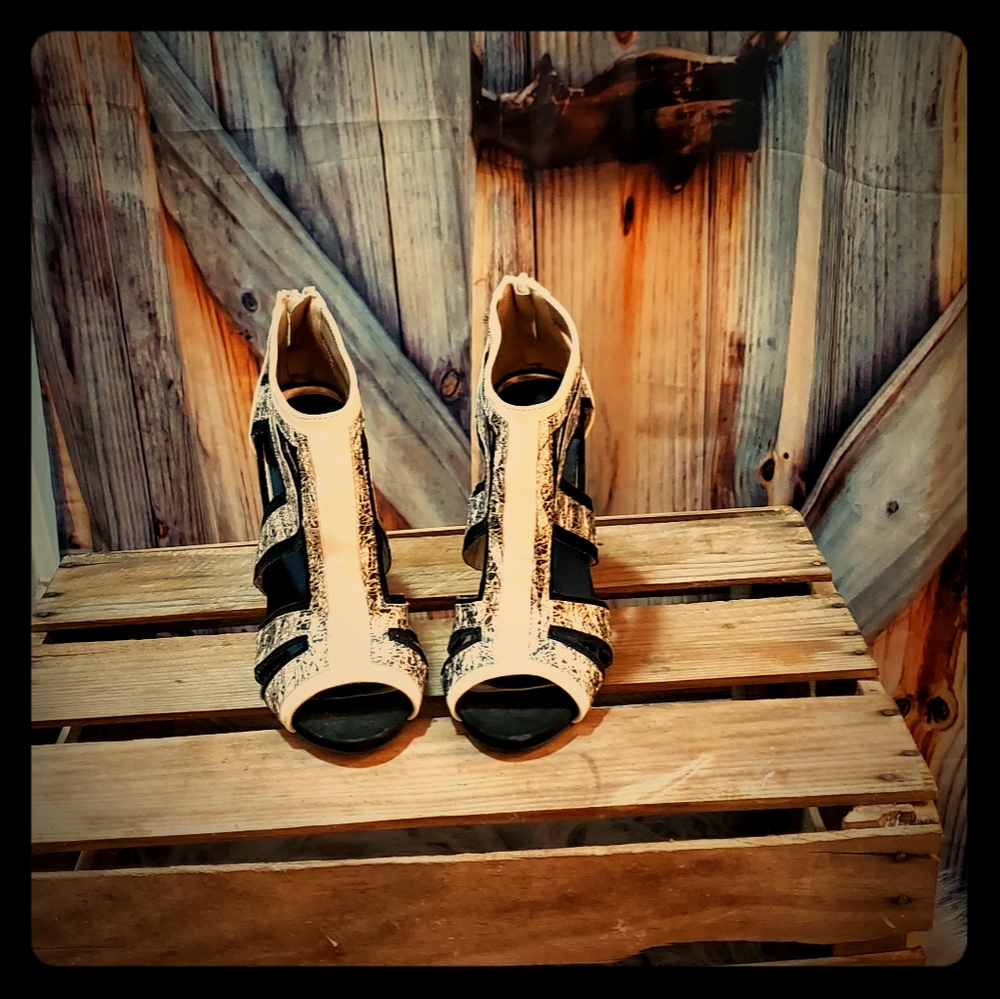 Black and white and silver high heeled shoes
